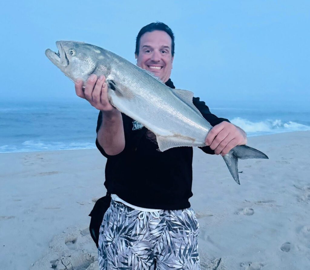 Jason Wilk (above) had a fun weekend surf fishing the LBI surf catching some bluefish, fluke and doggies.
