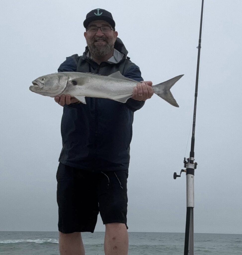 TJ got a bluefish this morning on a clam fishing the mid-Island surf.